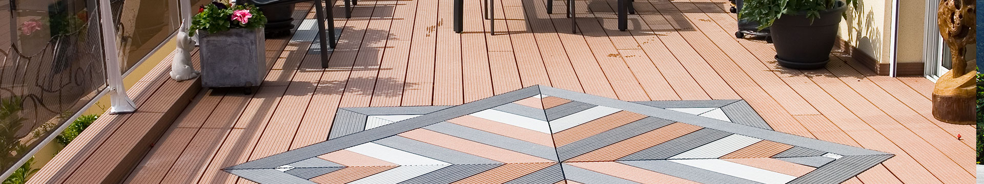 Composite decking with superior colour durability